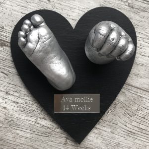 Two 3D Baby castings on a heart